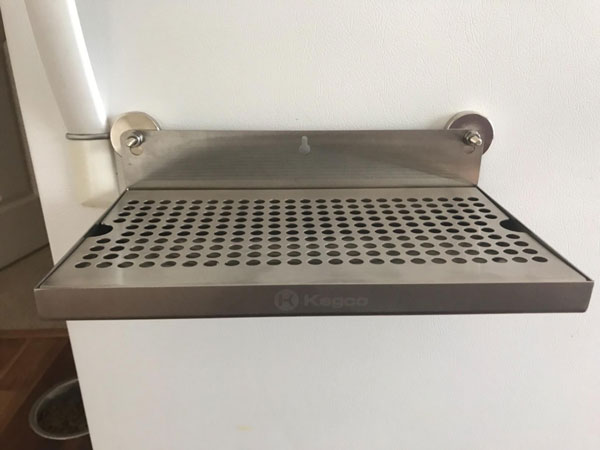 Holding Steel Trays in the Kitchen